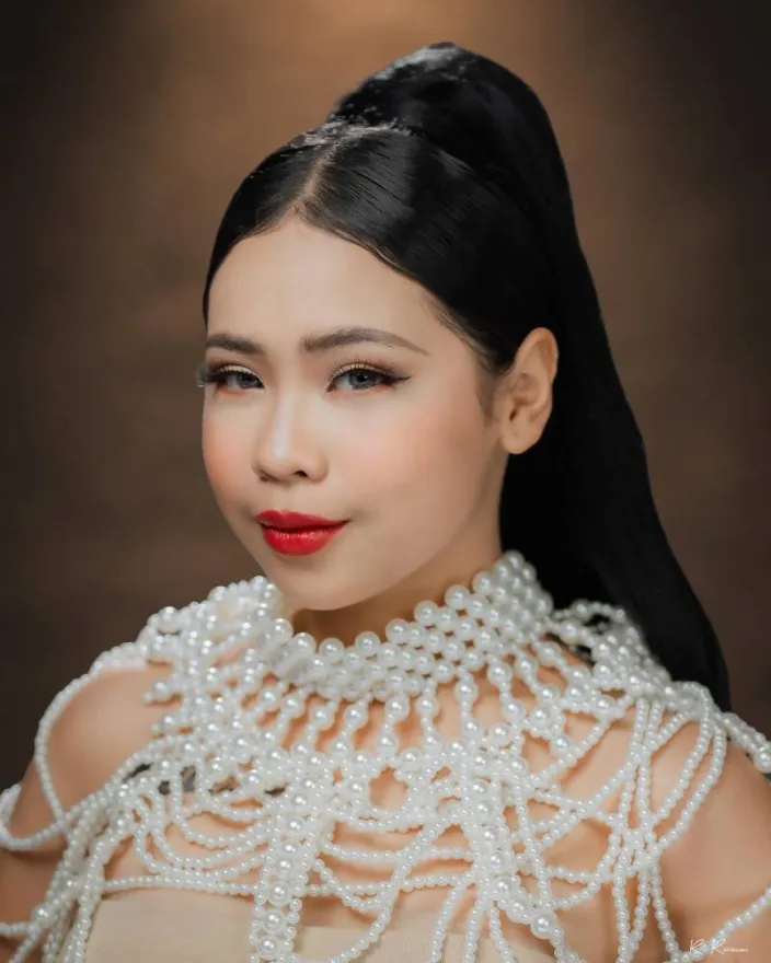 Kimsanm Iam E. Tan